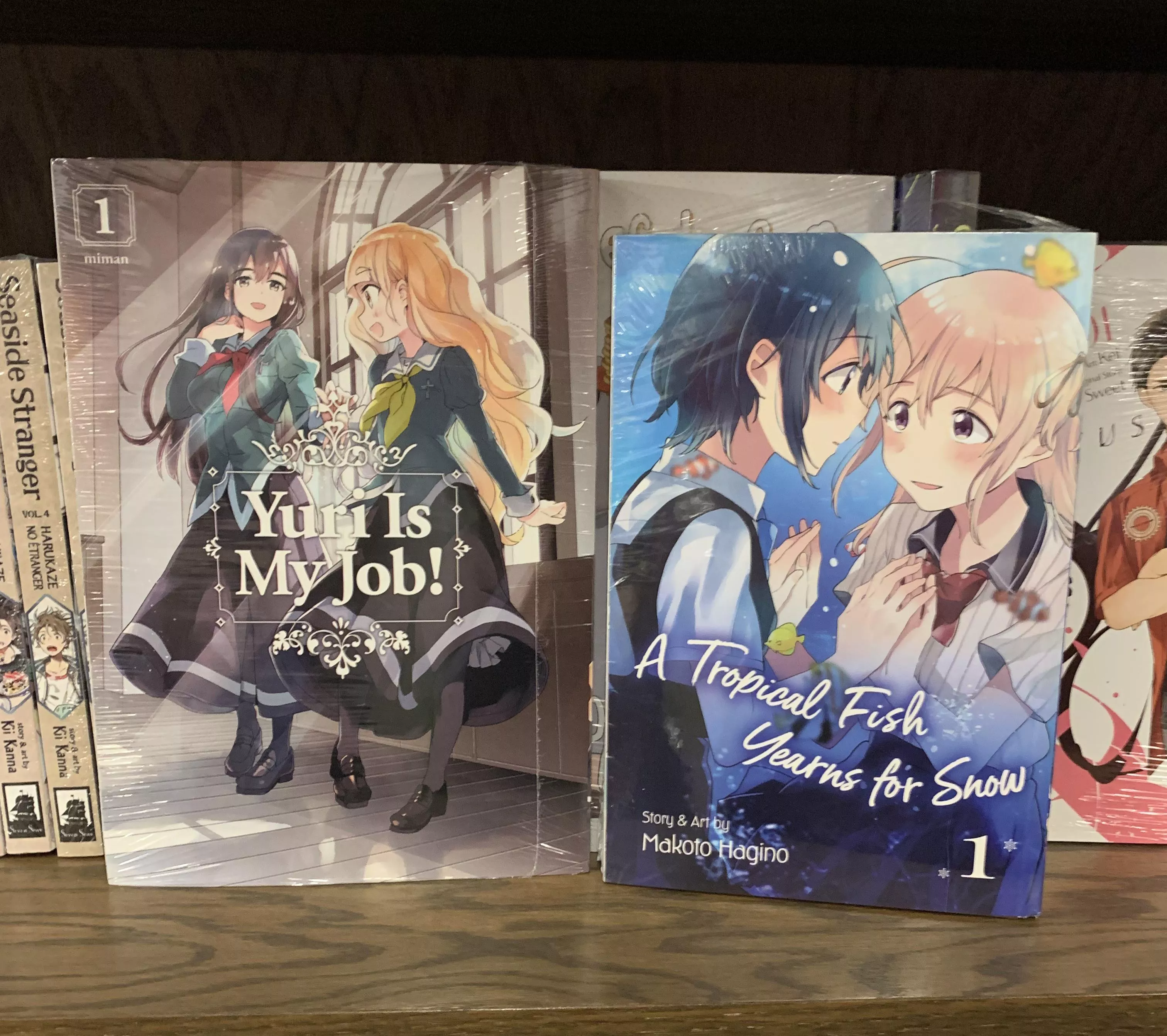 Quick Opinions, which one should I start? [The Tropical Fish Yearns for Snow] or [Yuri is My Job]?