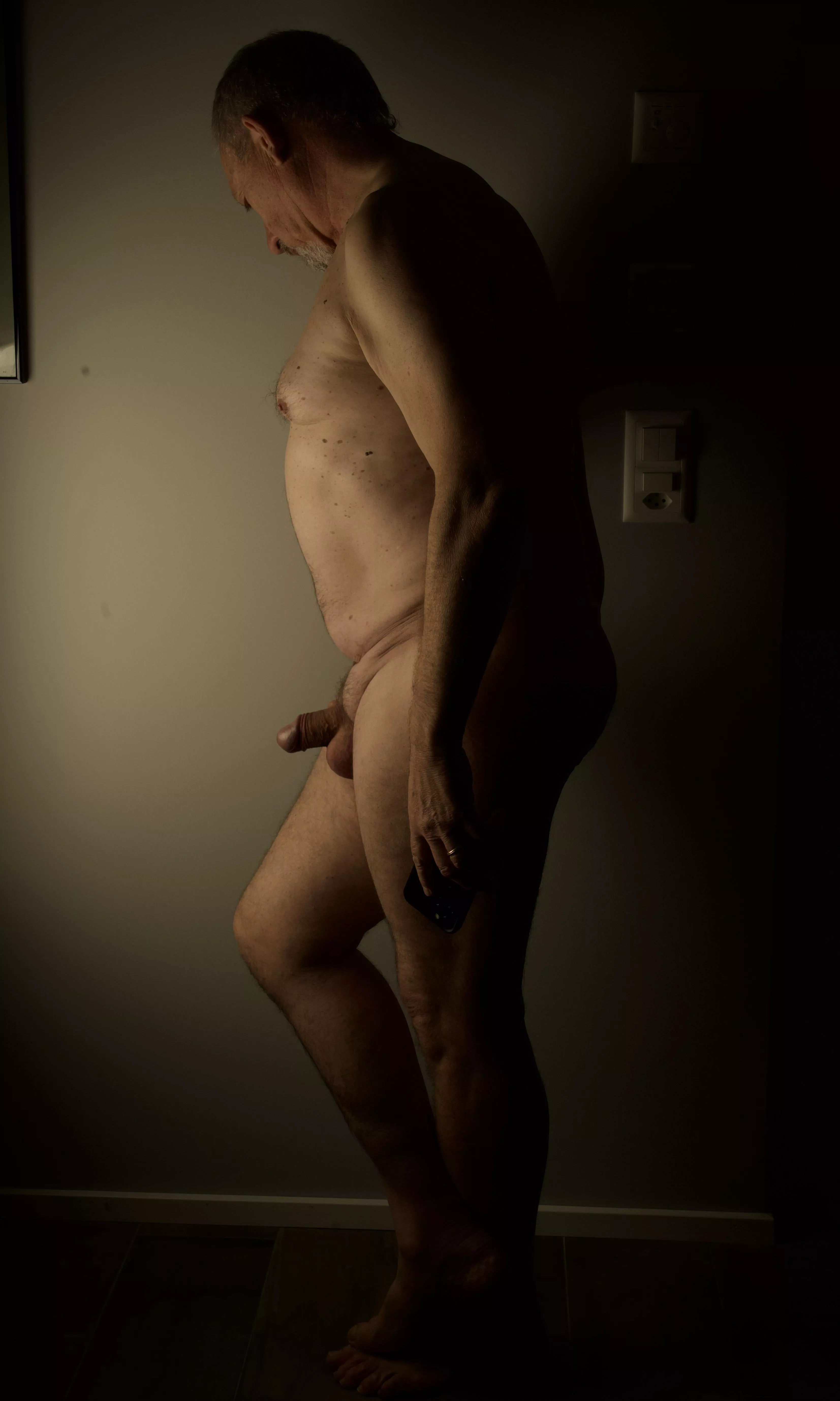 In profile (male full body)