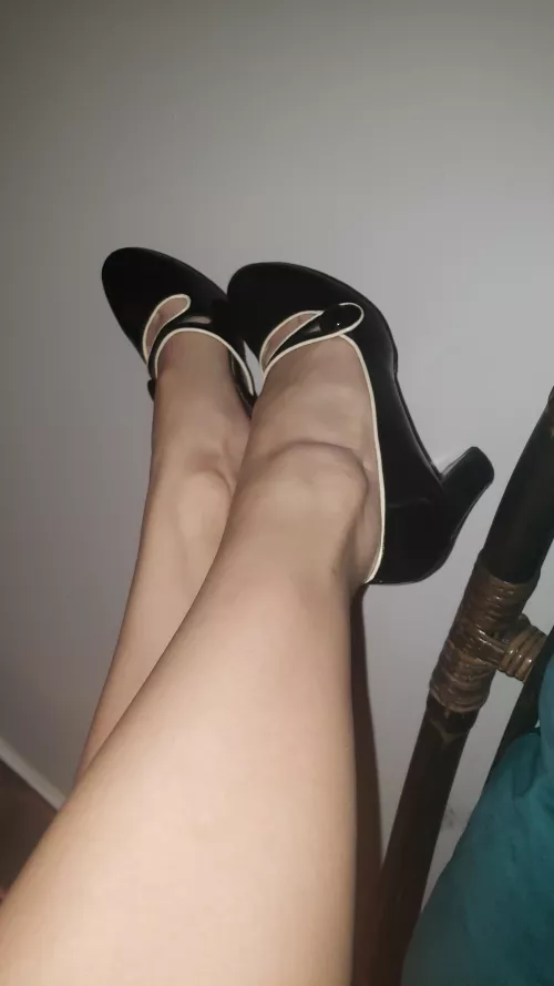 shiny black heels.