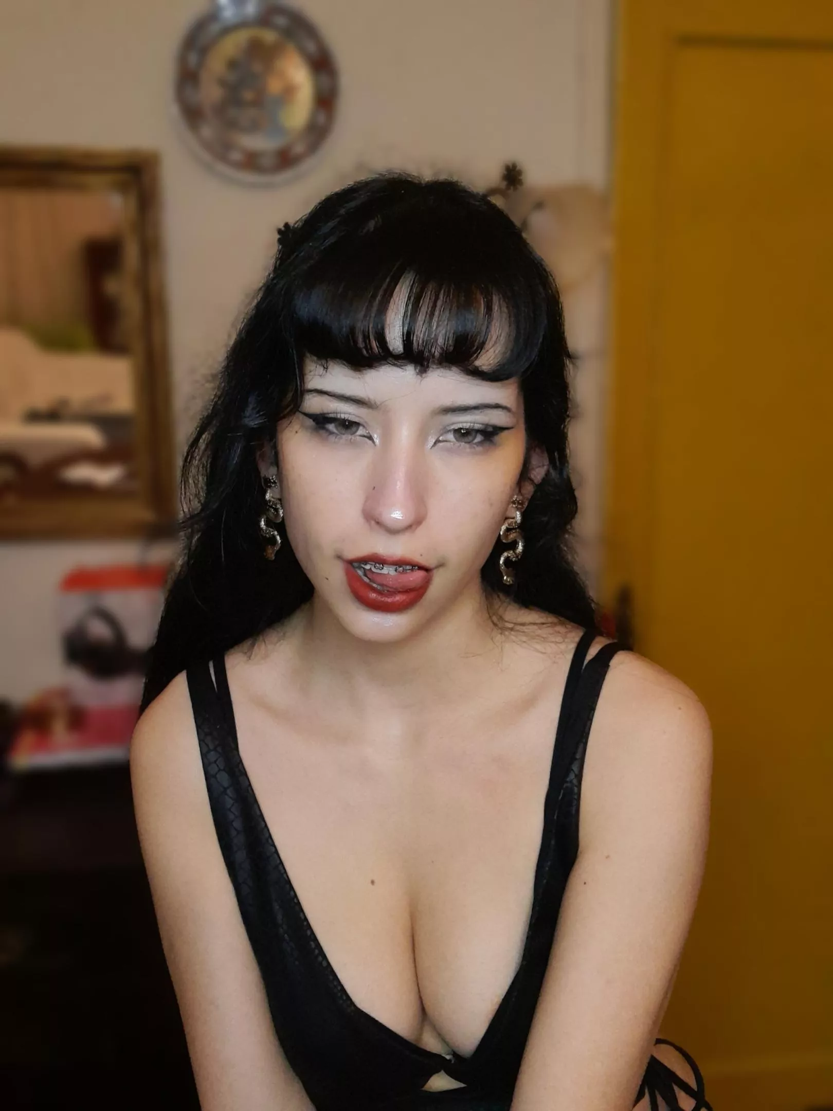 a pretty smirk and cleavage