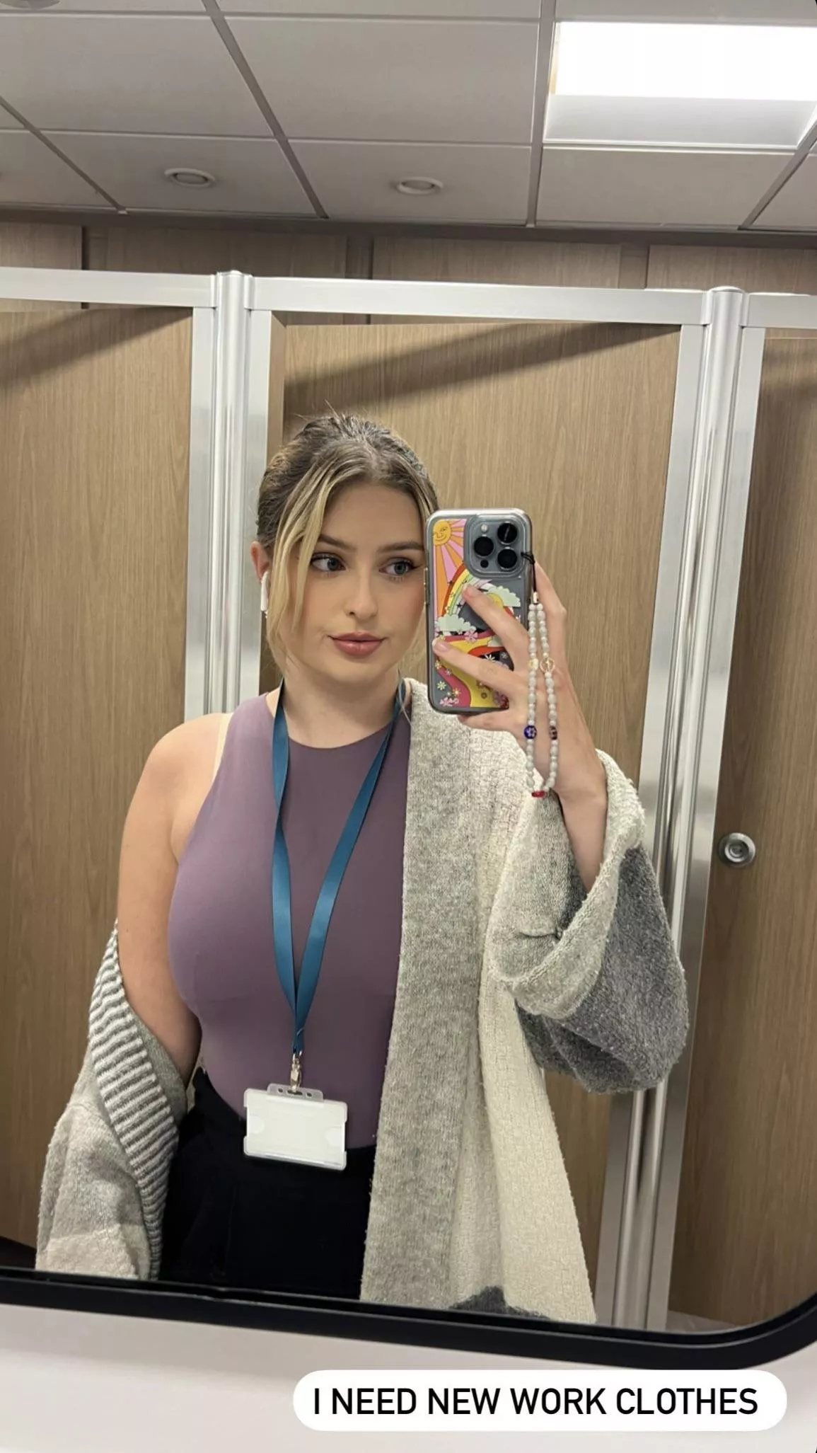 Covers her tits for work