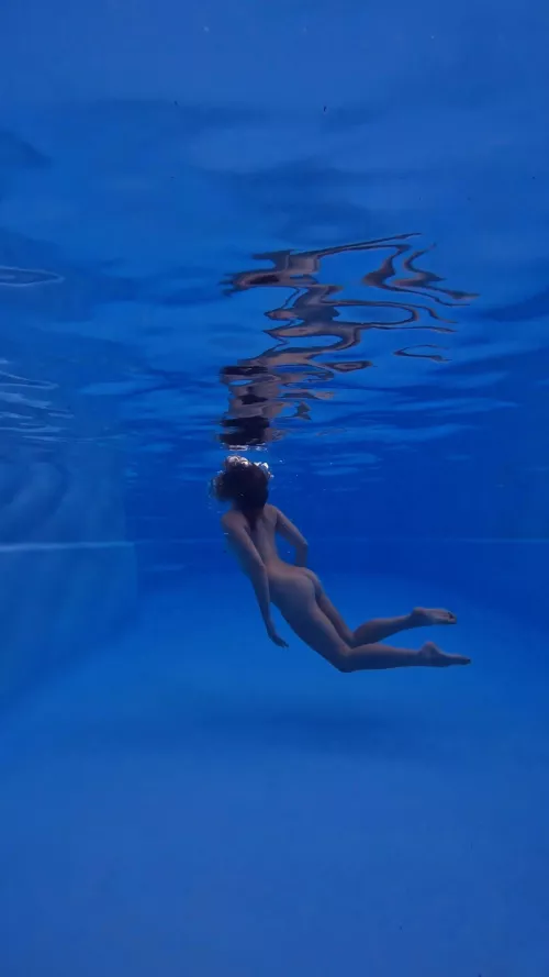 when I've got the house to myself it's off with the clothes and into the pool