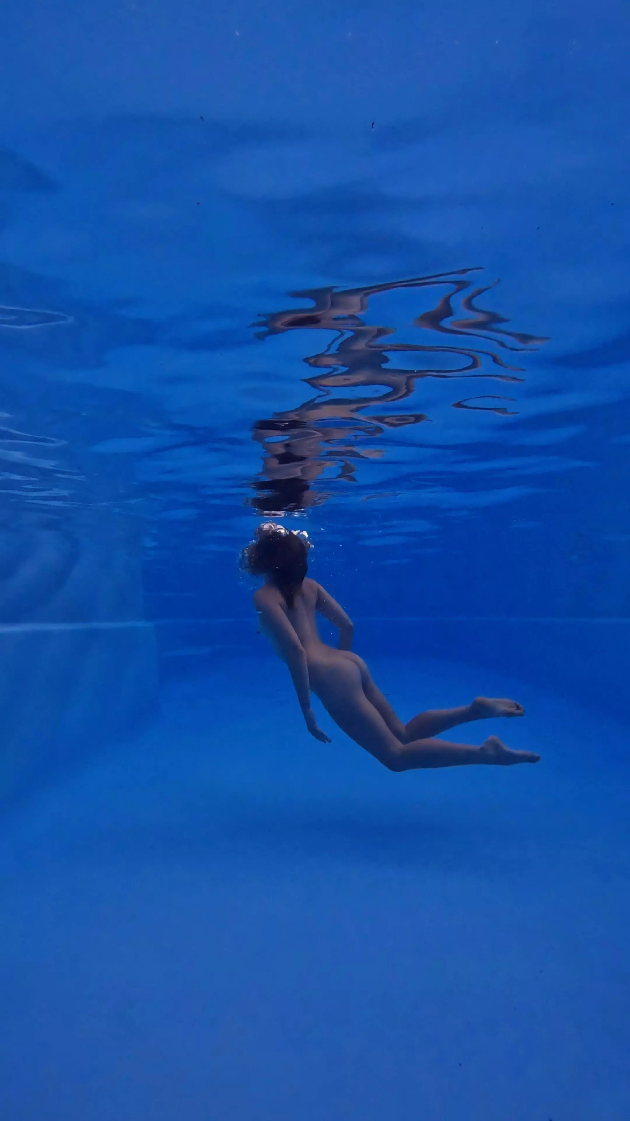 when I've got the house to myself it's off with the clothes and into the pool