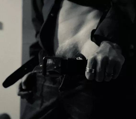 Undressing after a long day.