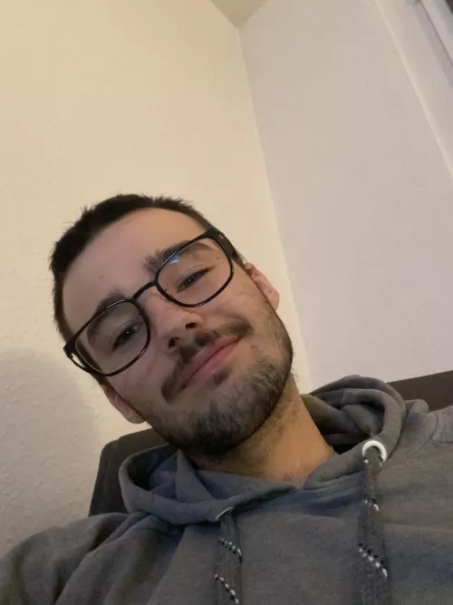 A rare pic with glasses. Kinda bored