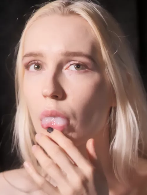 A little bit shy, but already with full mouth of cum!