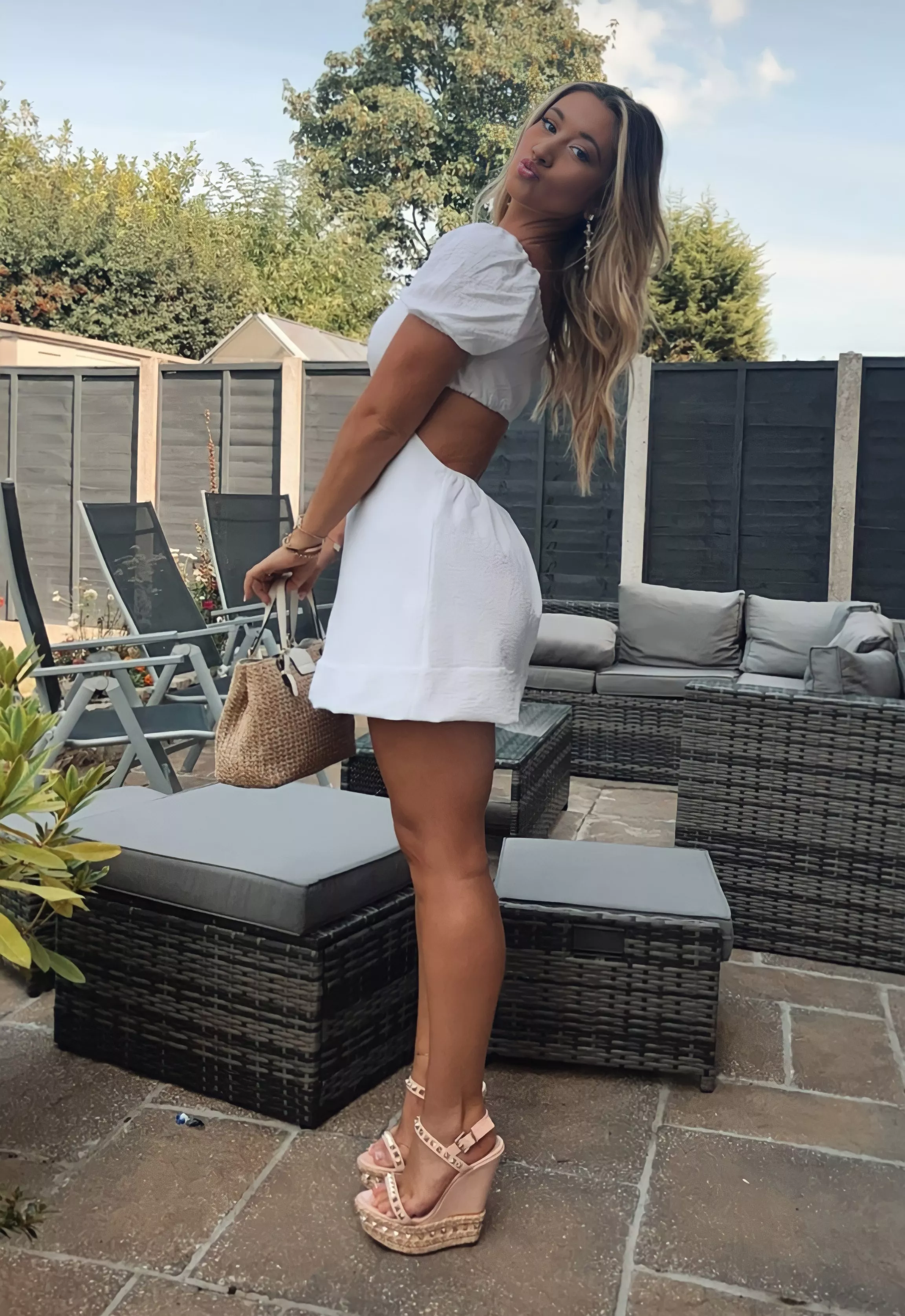 White dress and platform shoes