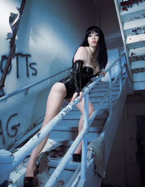 Legs for days and the perfect black latex ensemble.