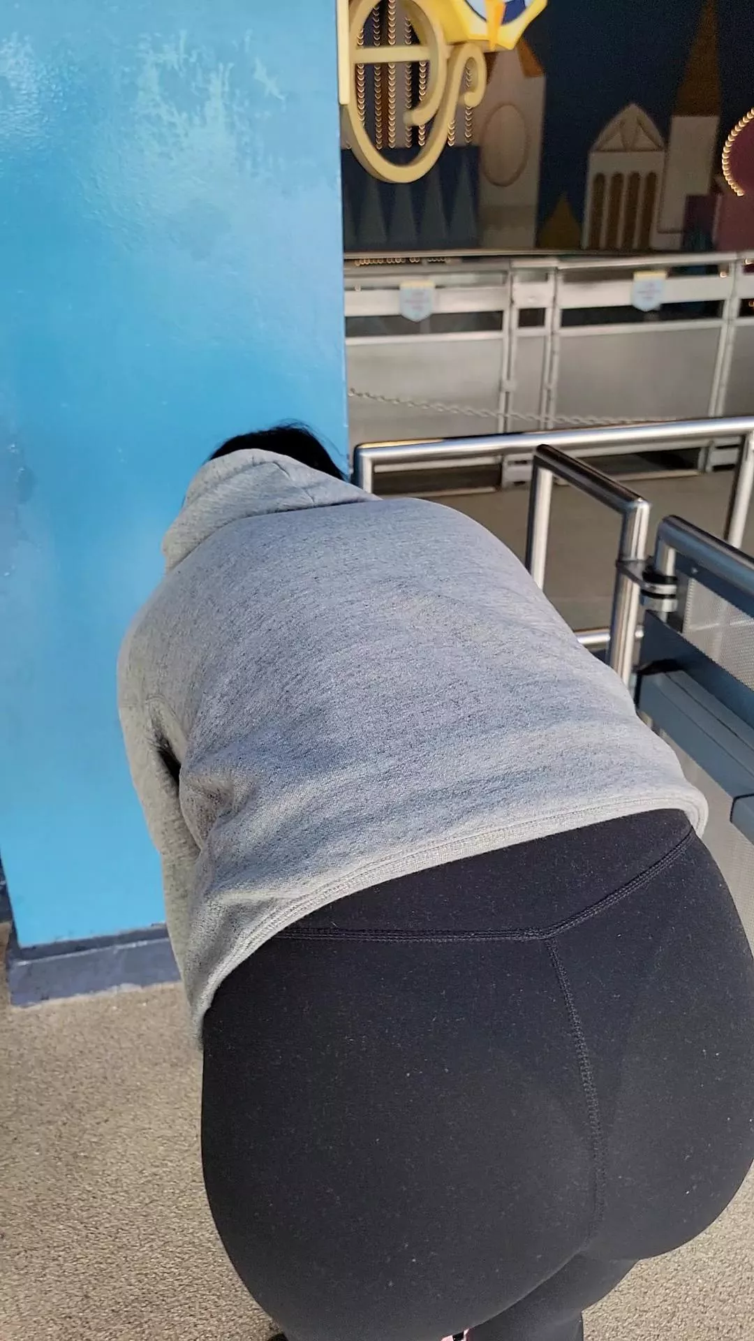 Stretching in line at It's a Small World!