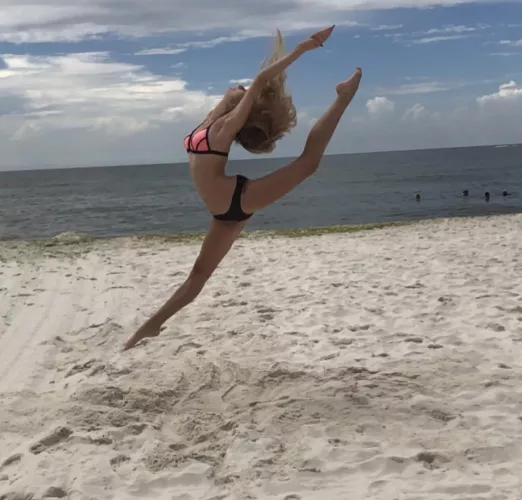 Showing off my flexibility in my bikini at the beach