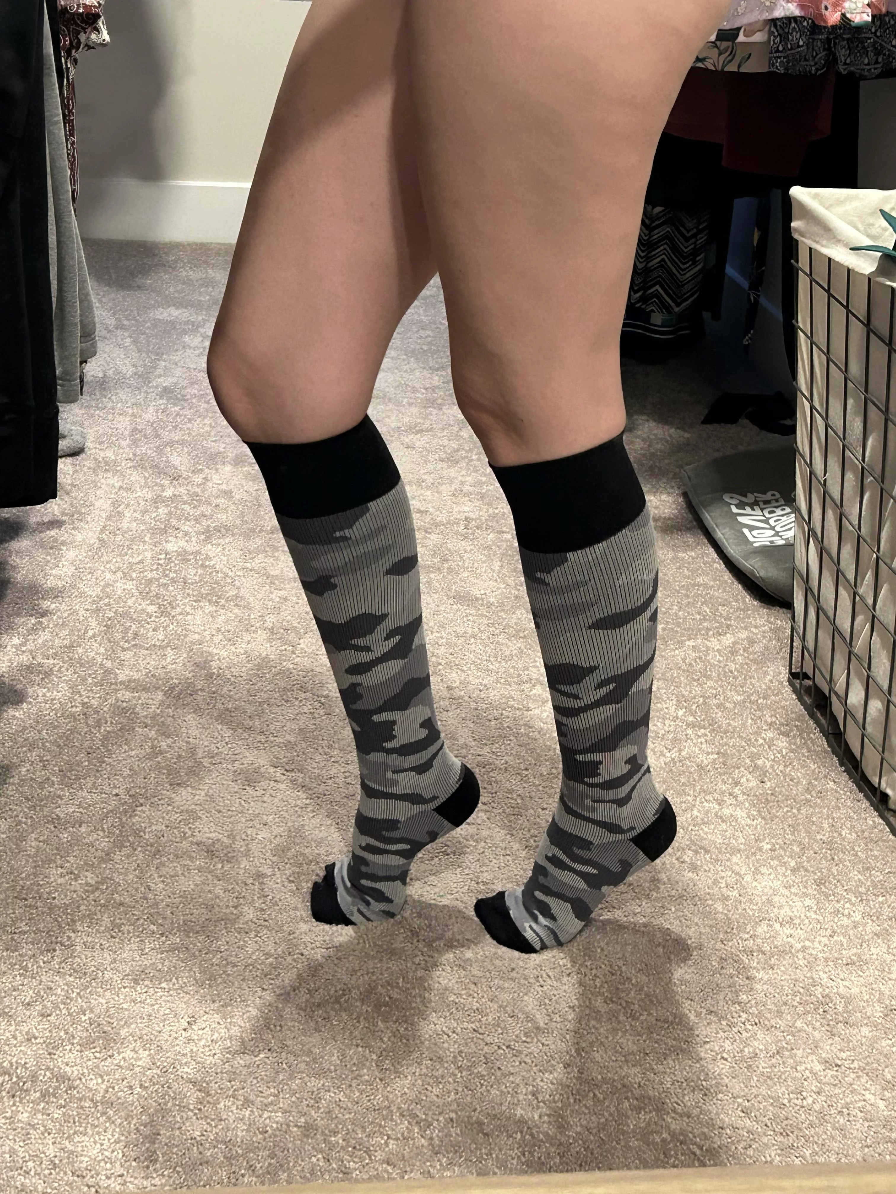 Wearing nothing but socks.
