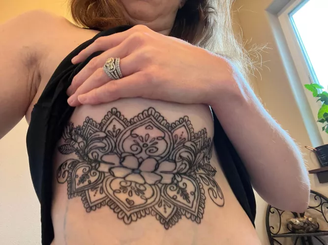 My wife’s first tattoo done by idoyatts in the PNW! She got it to cover up her implant scar and will add the other side in a week or so! Let us know what you think about her