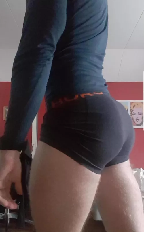 Squats, food, and protein makes yr ass grow.