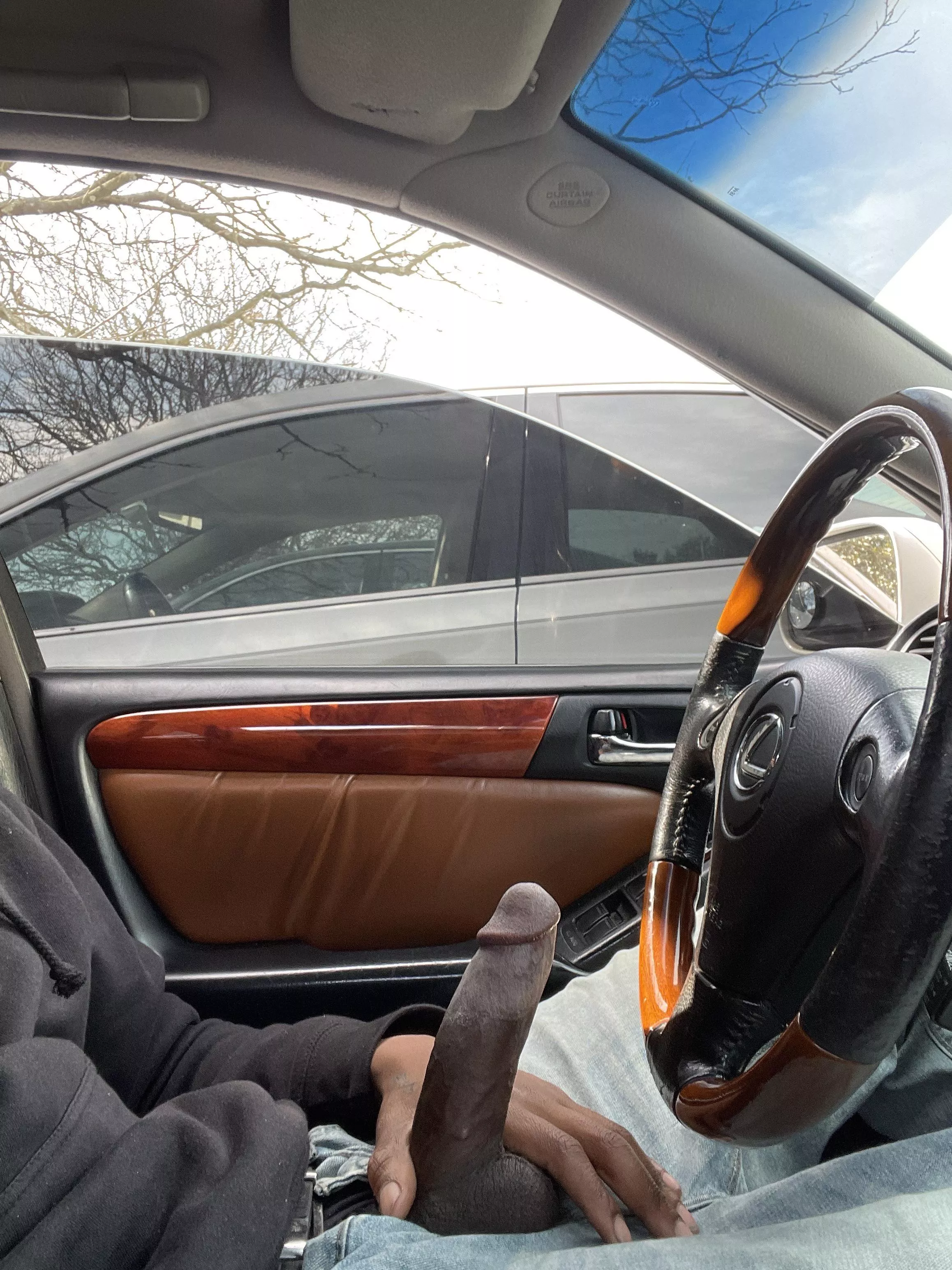 stroking in a busy lot