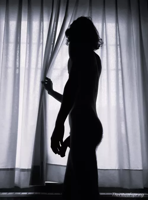 While peeking through the window