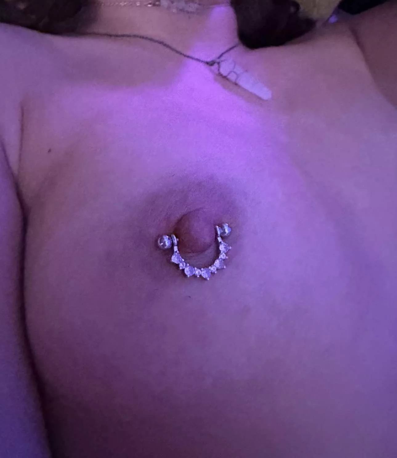 Up close of my perky pierced nipples