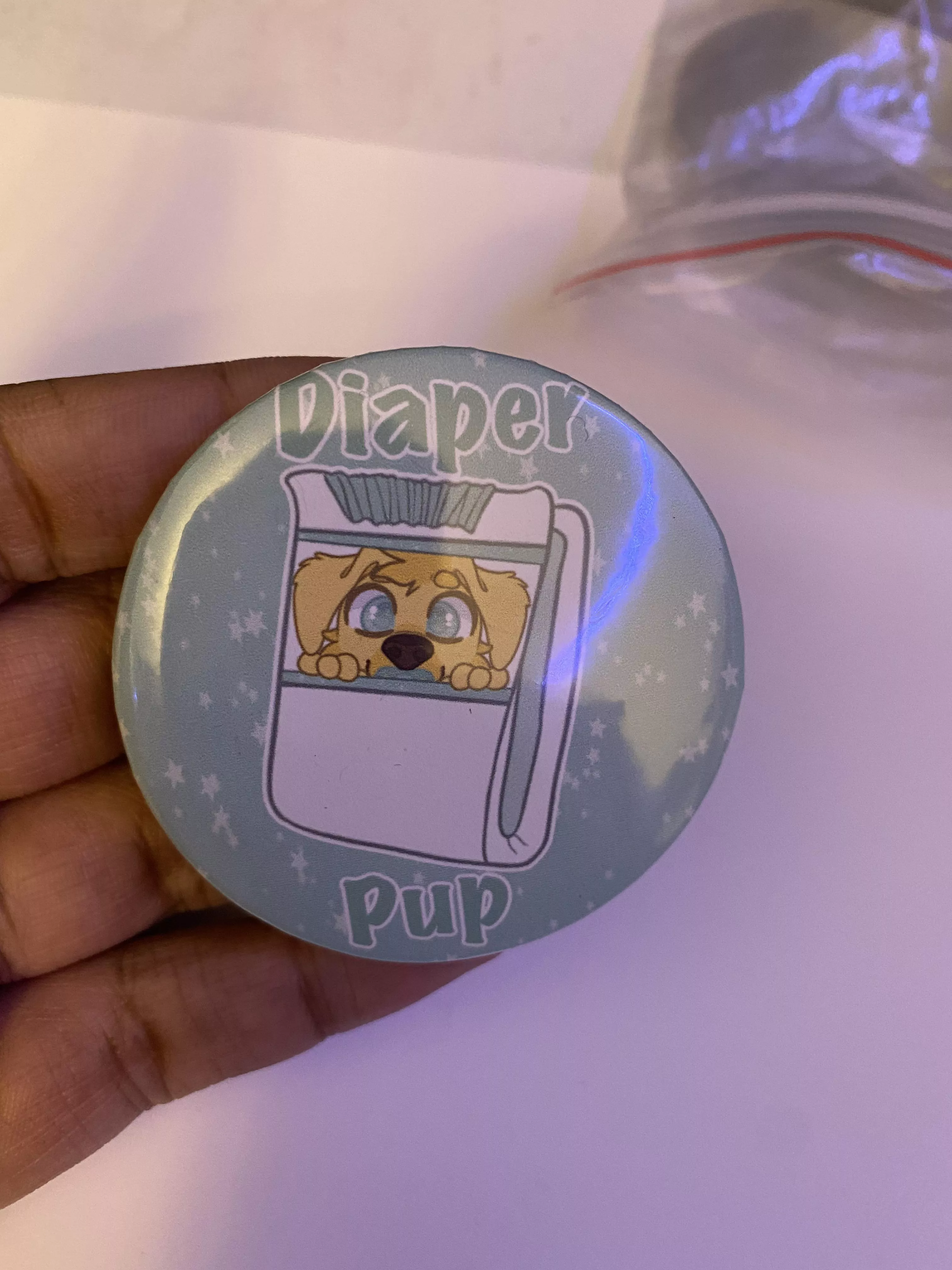 How does everyone feel about this button I made?