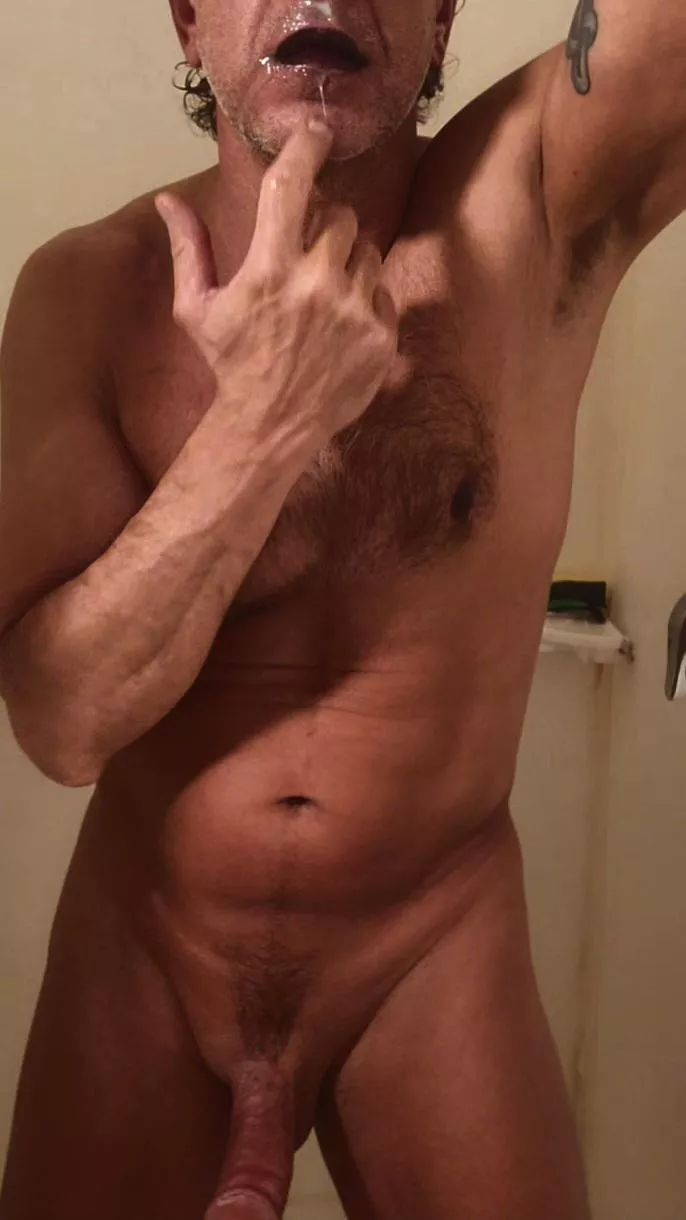Just finished coating my glossy lips with my cum.