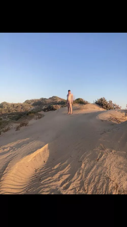 Checking out the beach with the sun setting