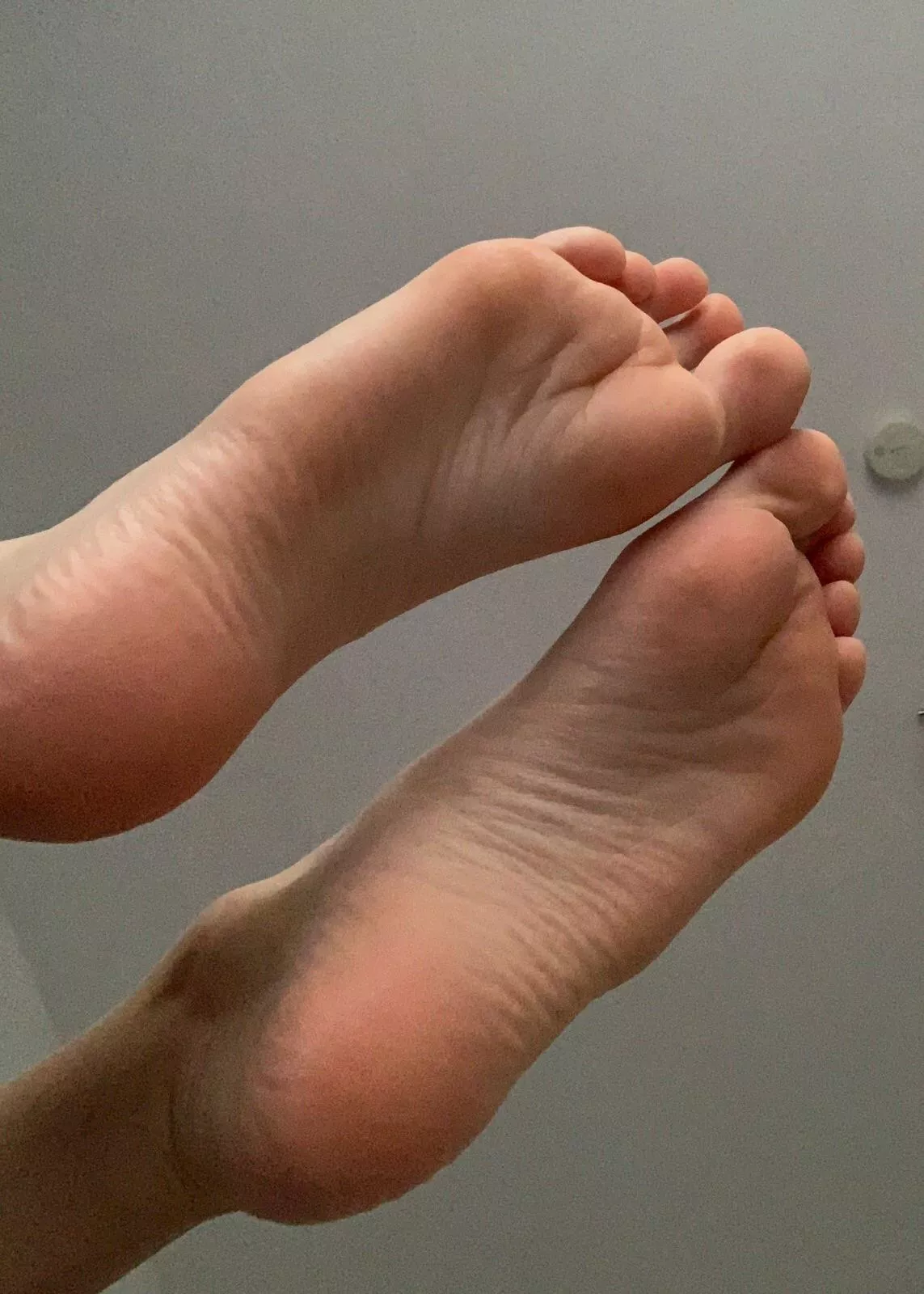 The floor is cold, can I rest my soles on your face?