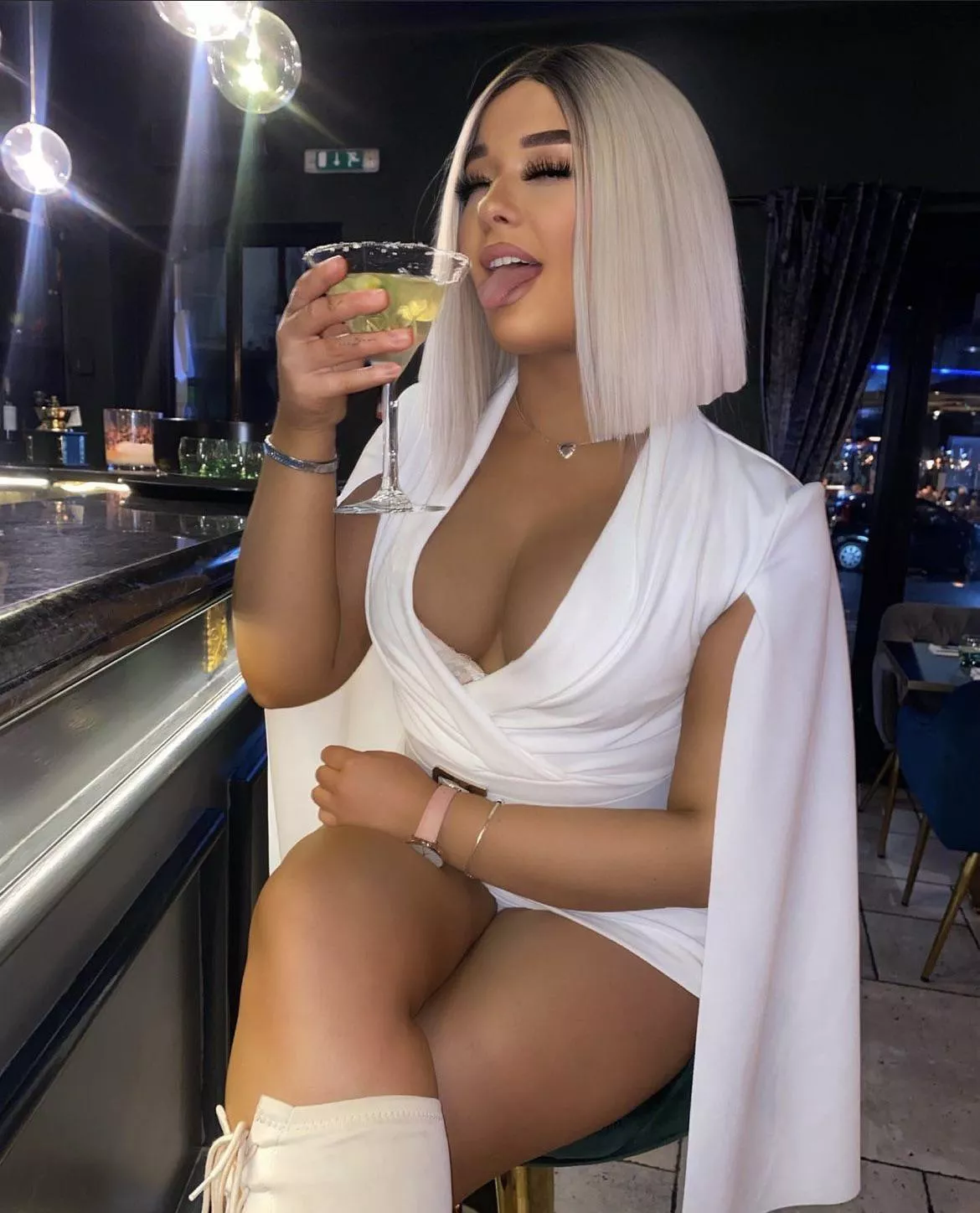 Cocktails at the bar with her