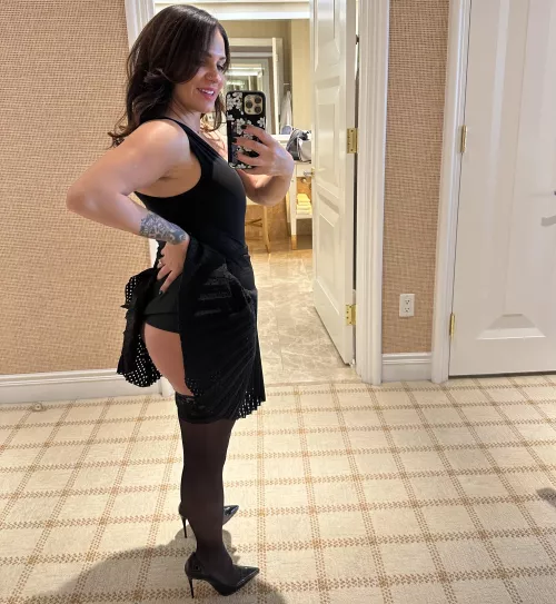 Shhh here we have a milf in the wild wearing dress up clothes. A rare sight. 45[F]