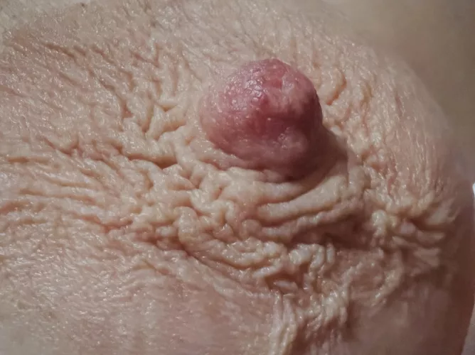 Big areolas all wrinkly from the cold.