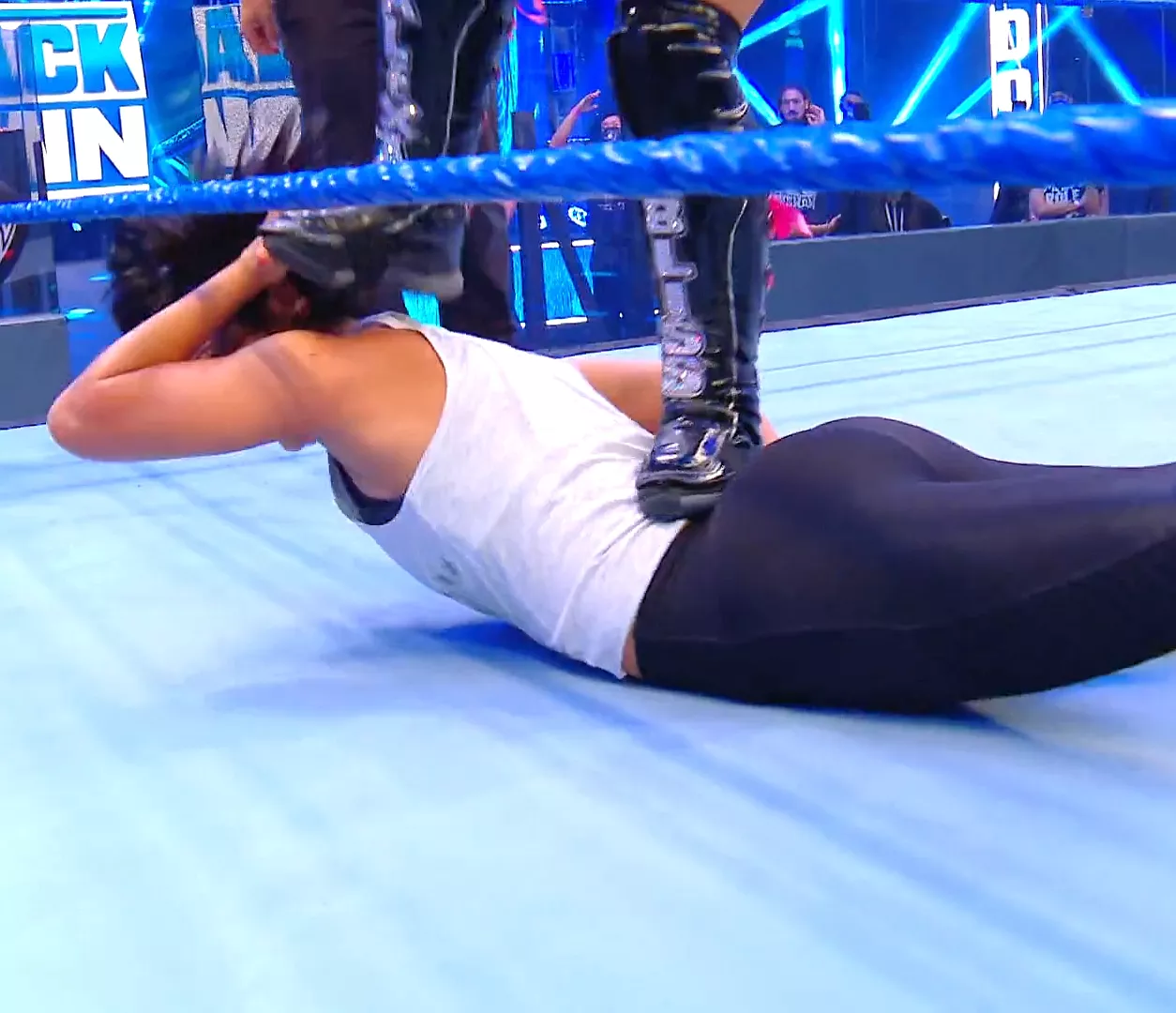 Bayley wrestling in leggings