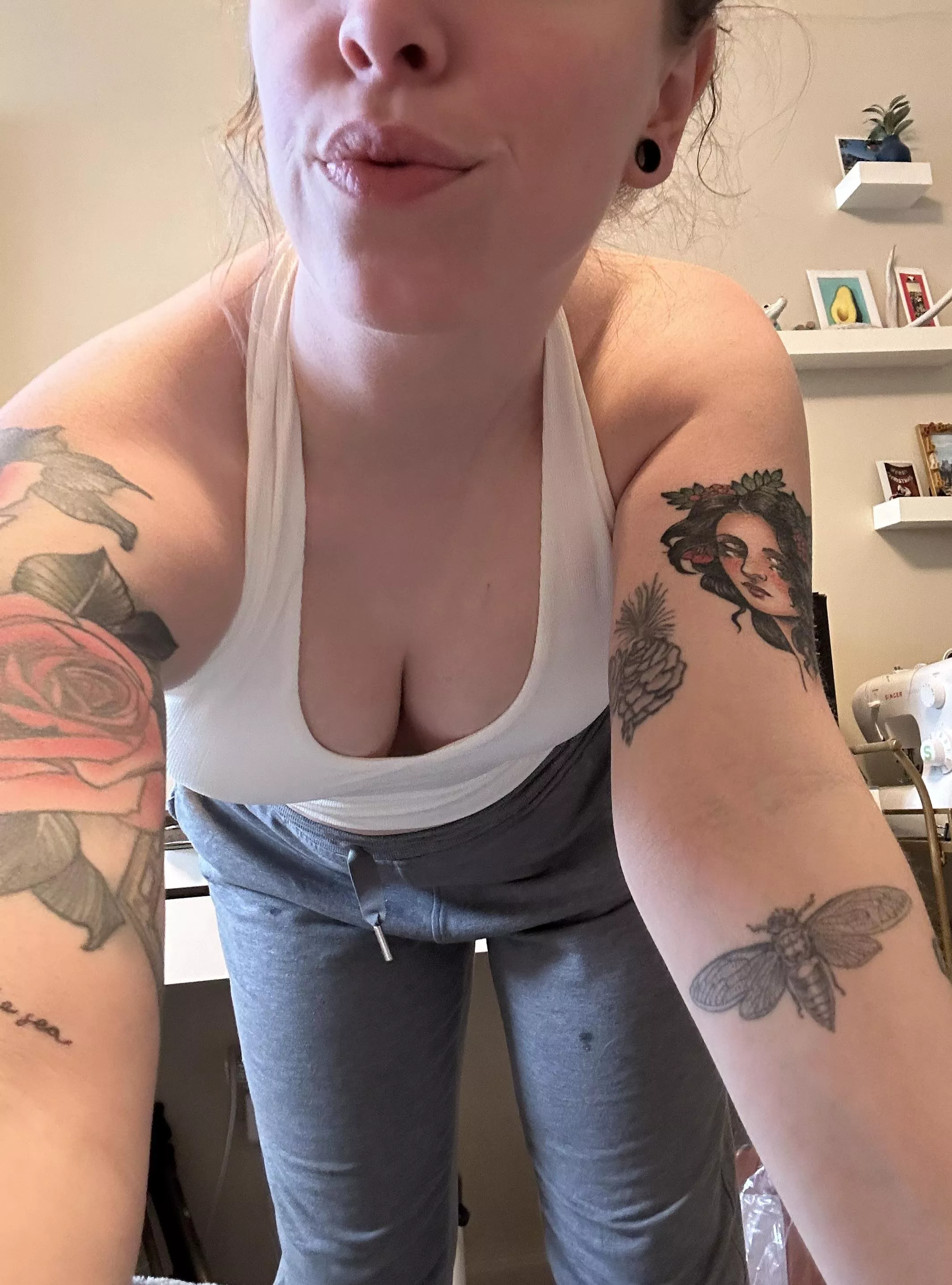 Bending over to give you a quick kiss