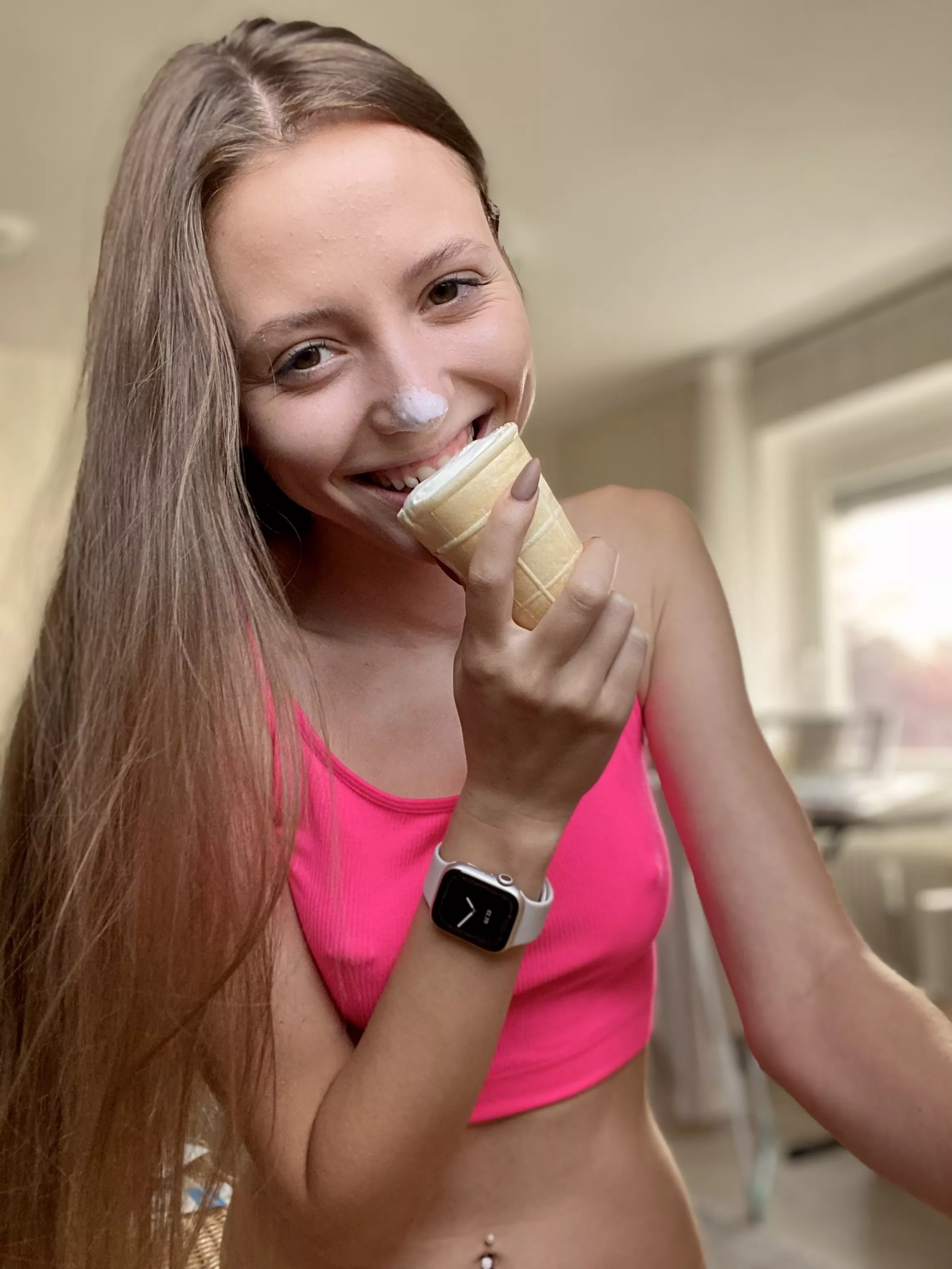 Neon pink top can't hide my pierced nipples