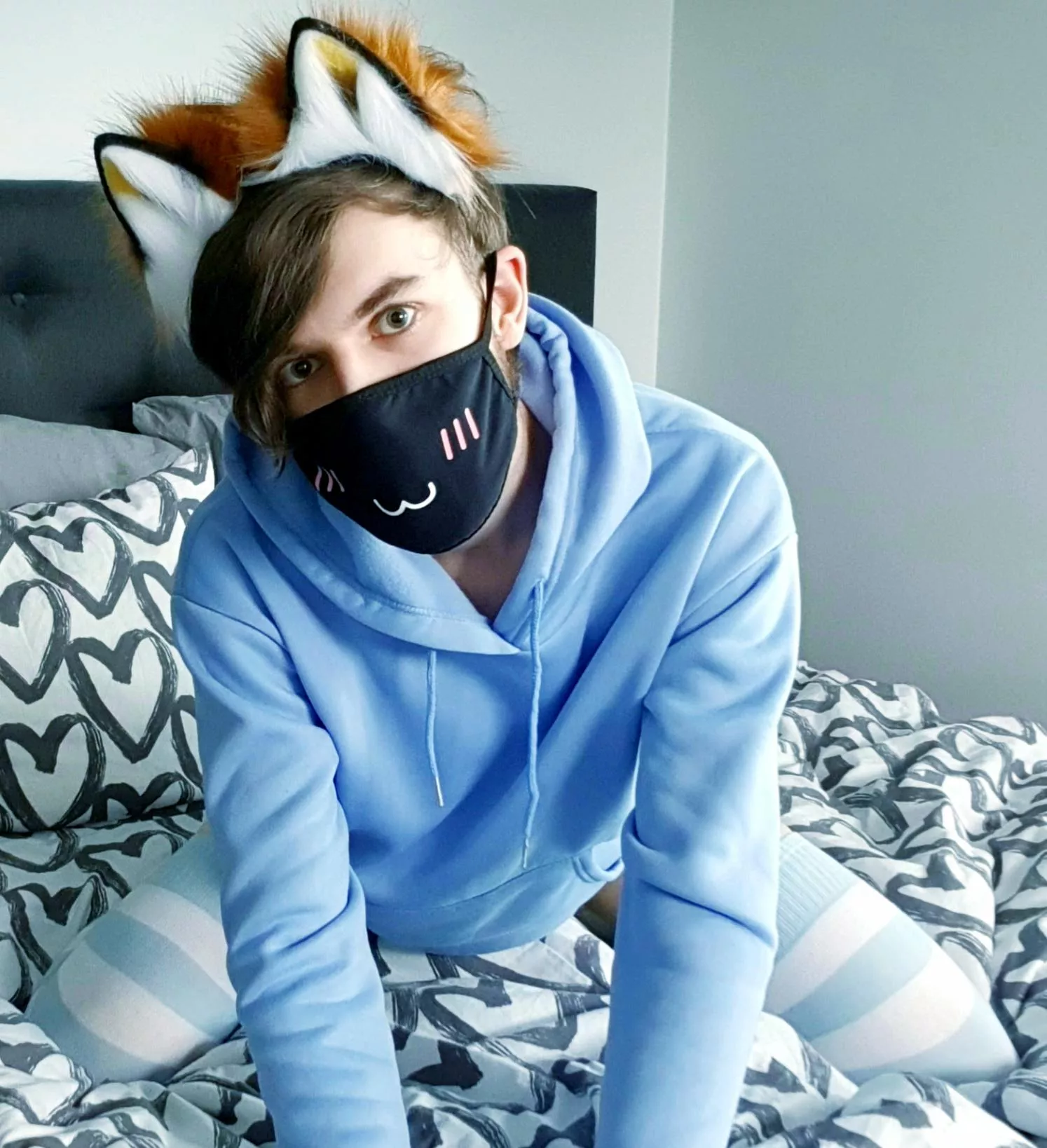 Catboy on the bed, what are you doing with him?