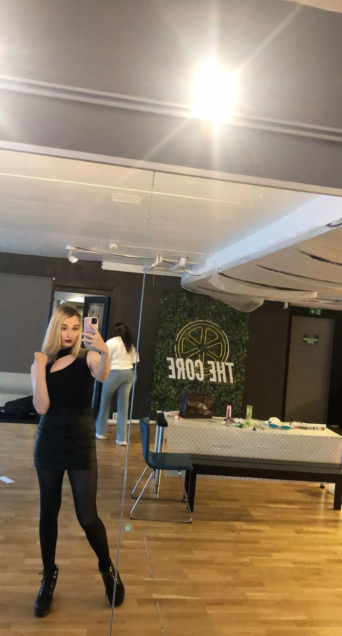 The girl in the back of the photo just got done doing my makeup ready for a date