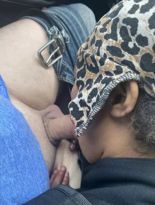 Feeding her cock in her driveway