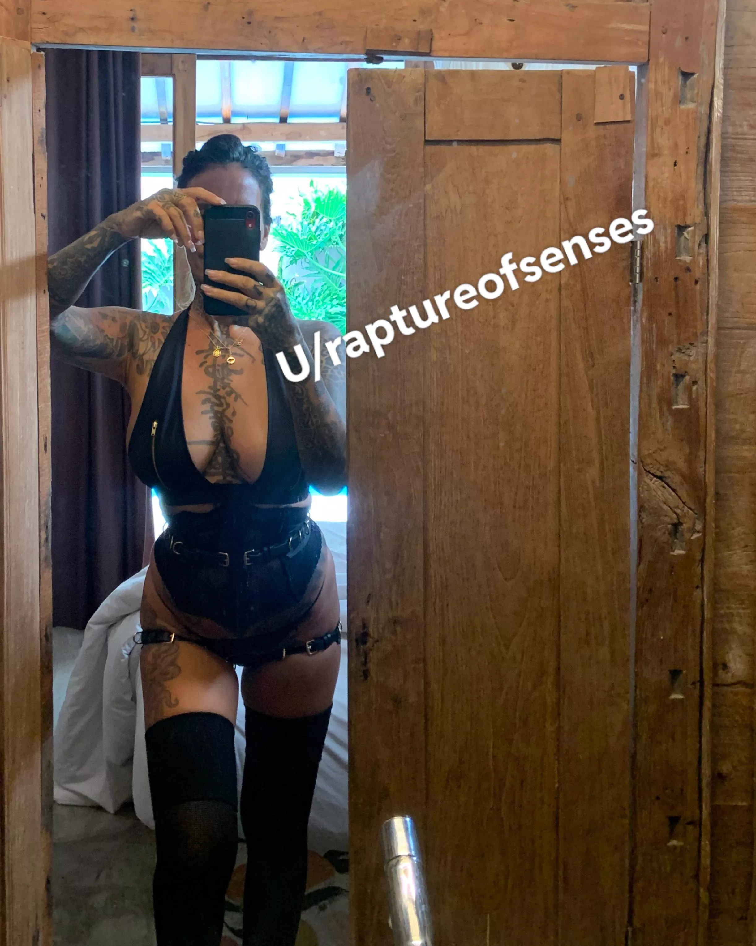 Mombod in leather and knee high boots