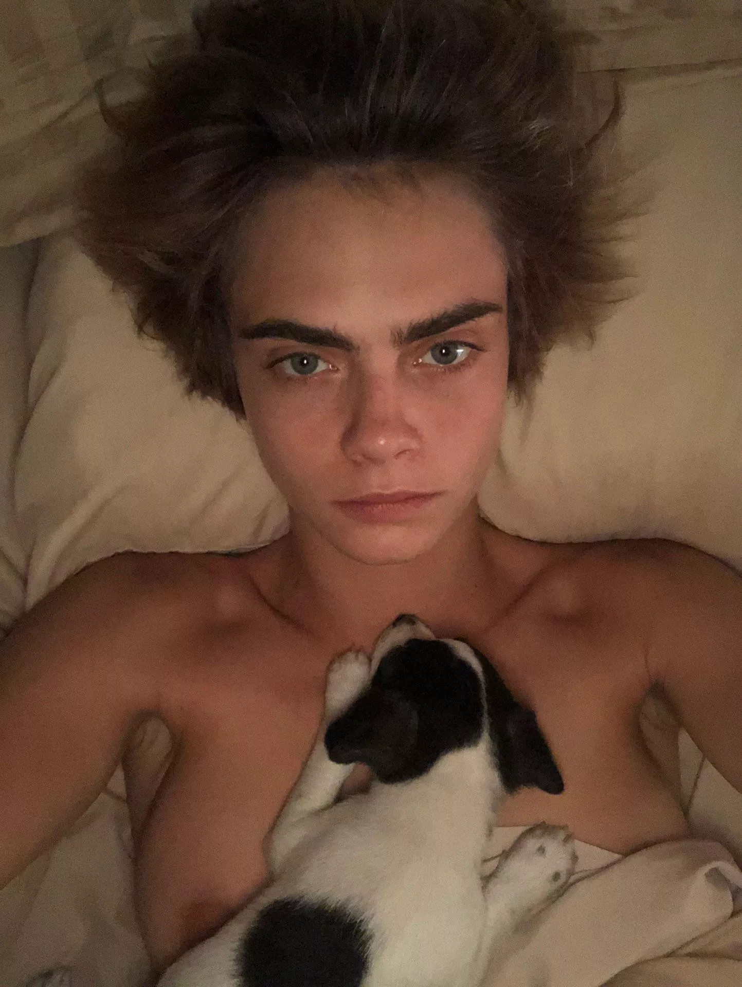 Cara Delevigne Topless with Dog