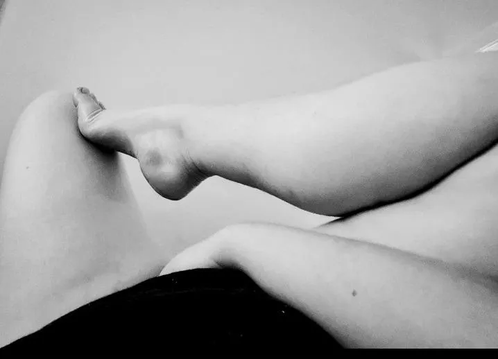 Lifting my leg to get just the right angle. I wish my fingers filling me up was your cum instead ✨️