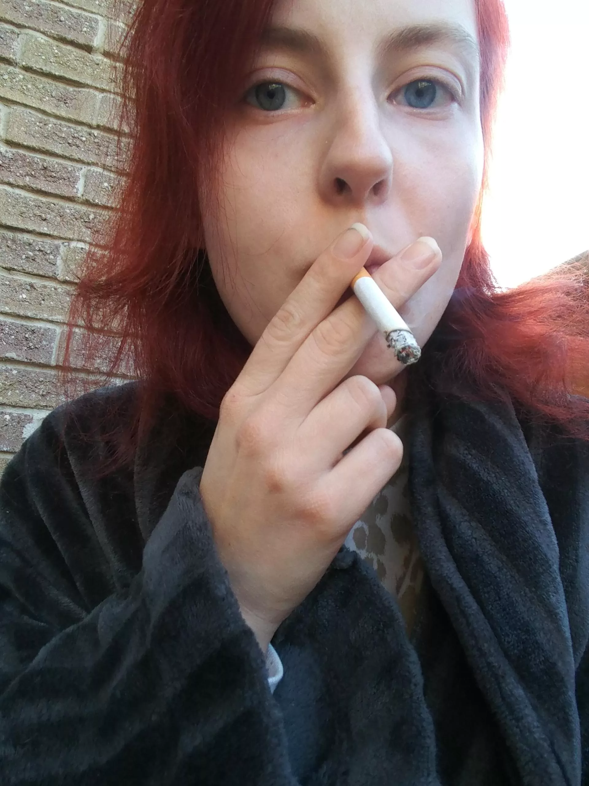 Sitting out in this beautiful sun having a cigarette! 🚬