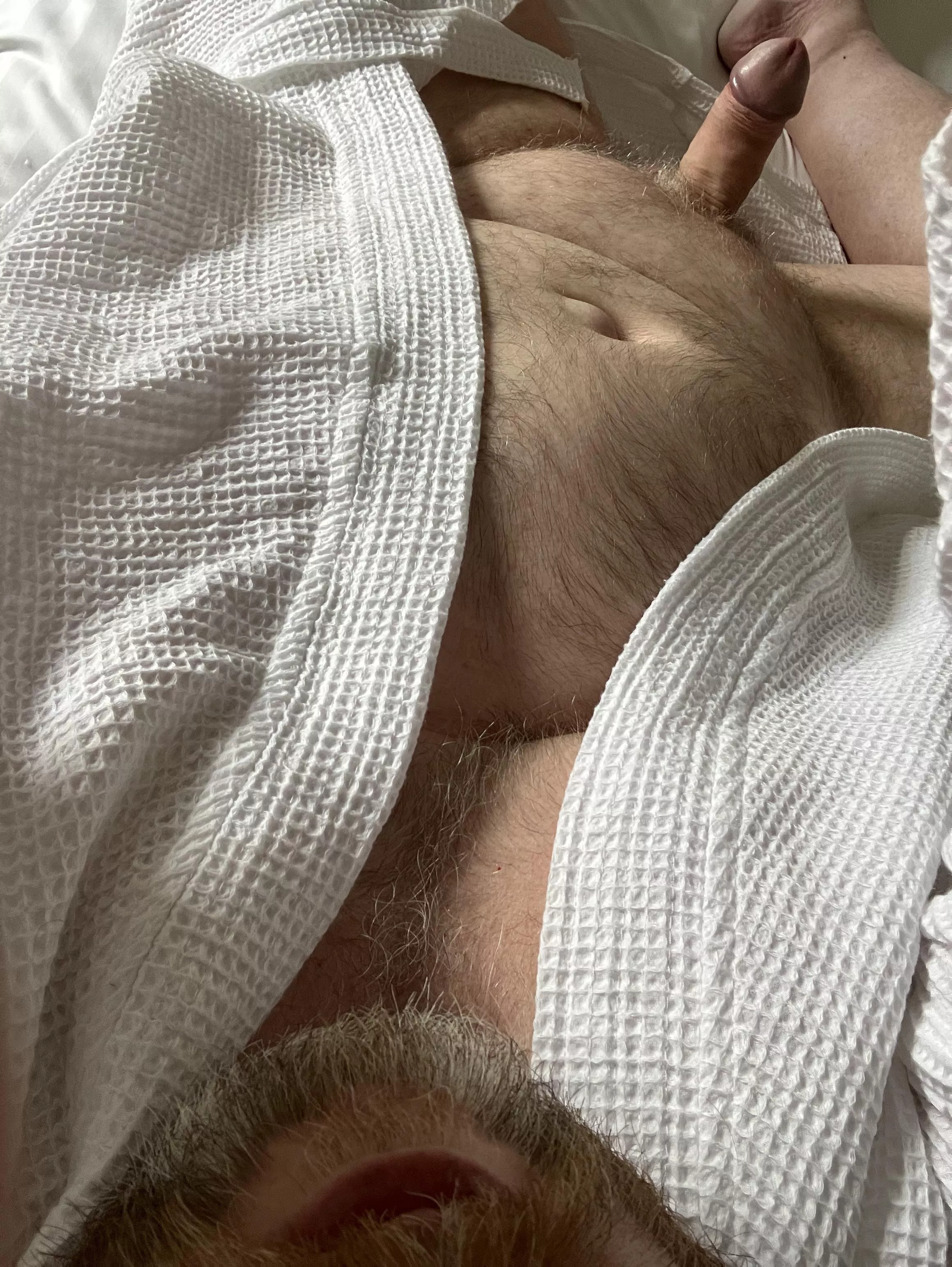 Trying out the hotel room robe.