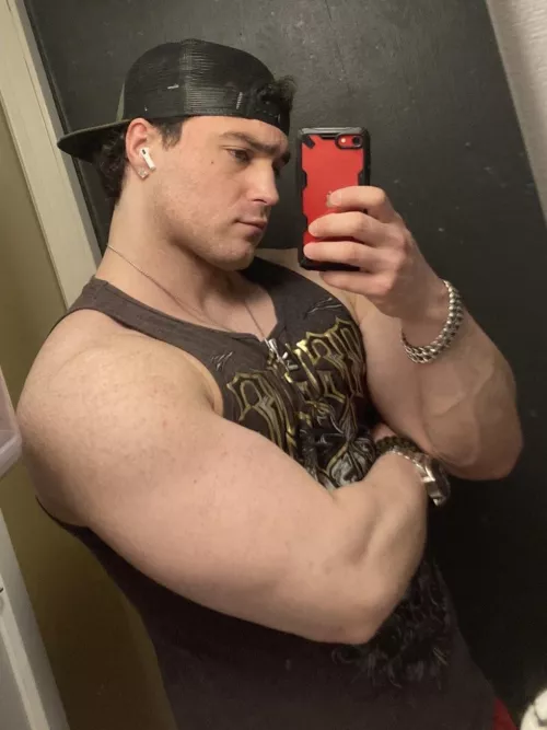 I'm pressing my arm against my chest to make it look bigger