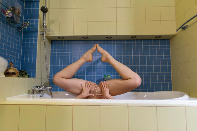 in transparent panties in the bathroom