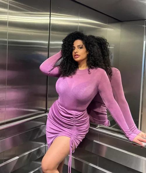 She can hide in the elevator but she can not hide those jugs