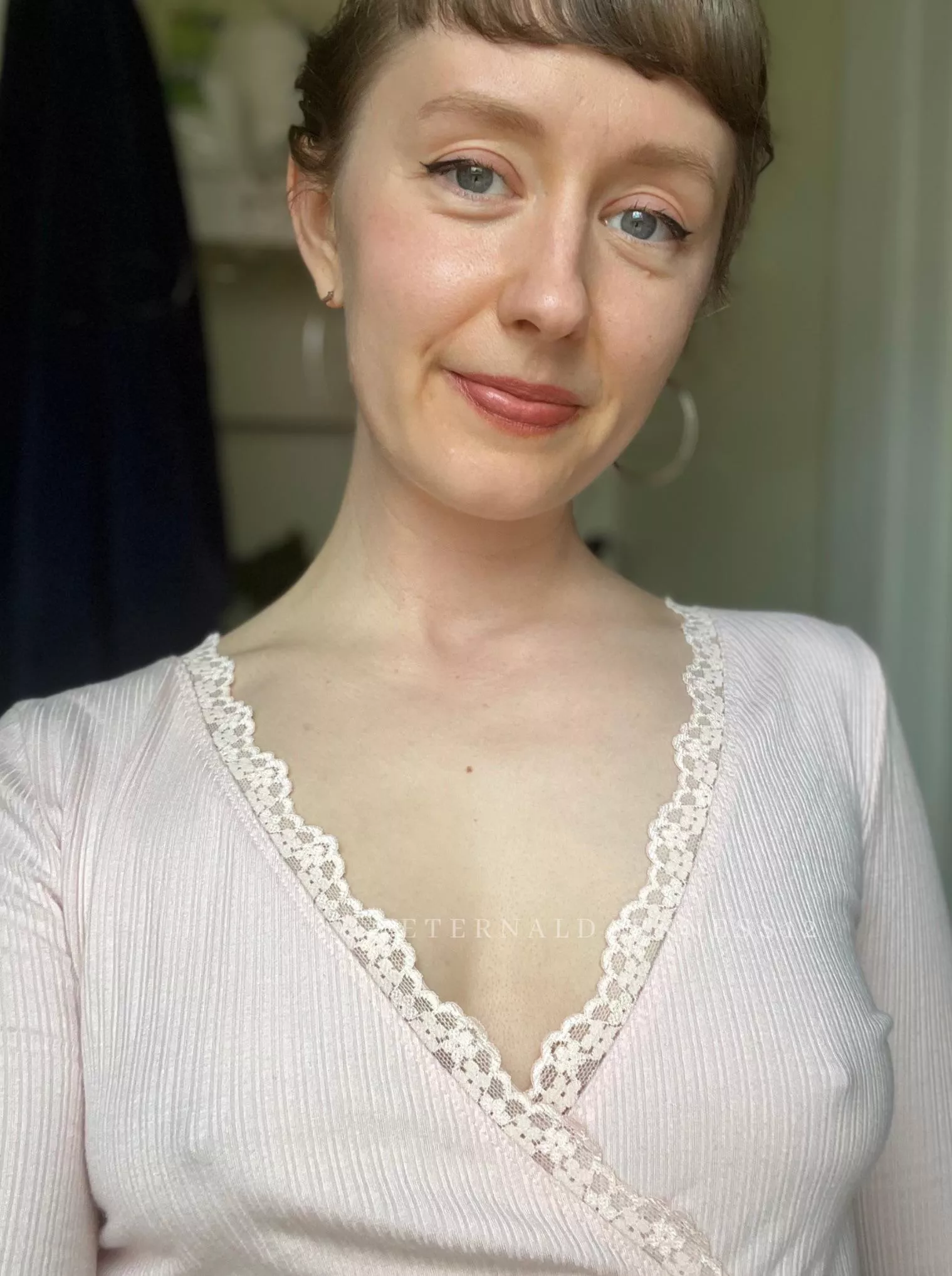 They look so soft and perky in this pale pink shirt!