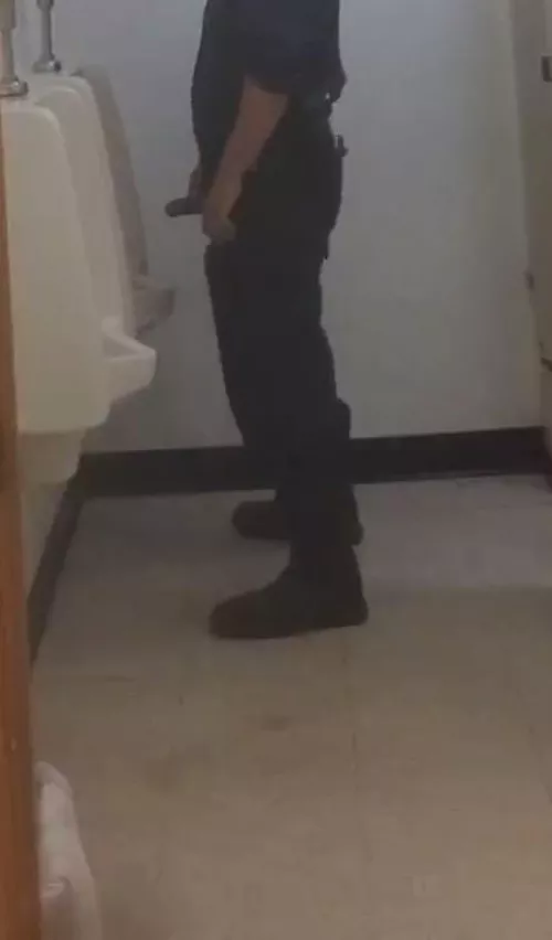 Coworker taking a piss
