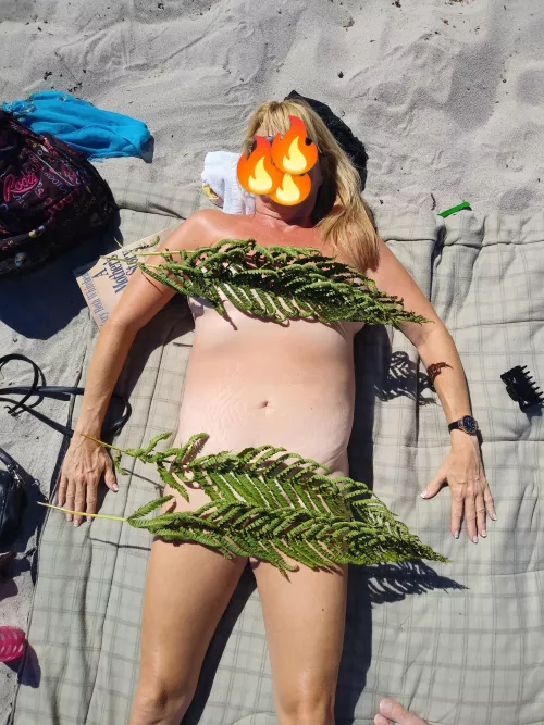 A little shy but enjoying the sun and sand naked 🔥