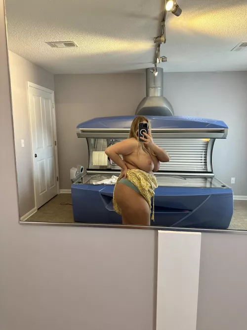 Getting naked in the tanning room.