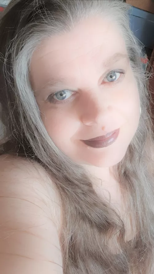 Salt and pepper hair.