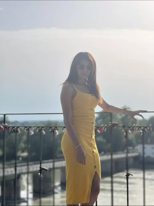 A yellow sundress on brown skin is a win-win