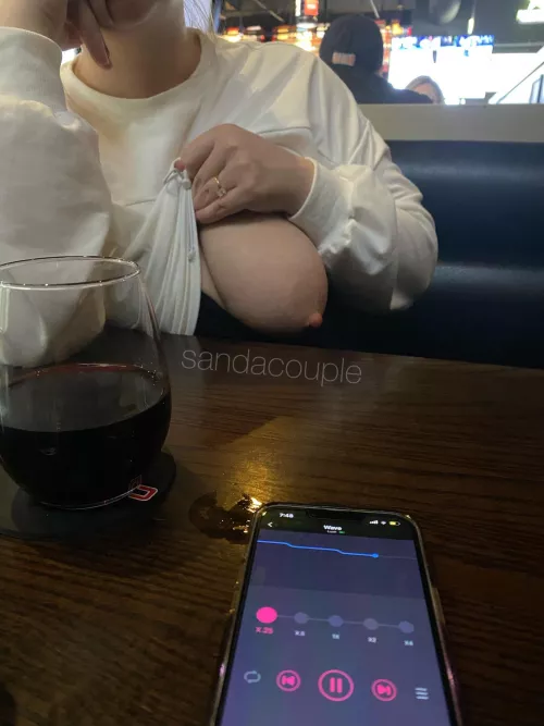 Showing off my tits at a local bar while a stranger controls my vibrator [IMG]