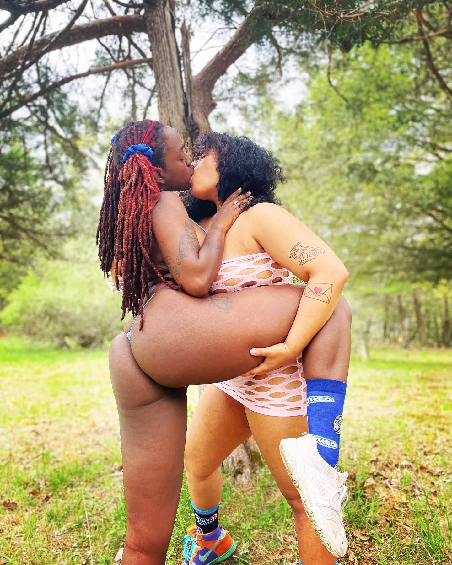 Spank her while I kiss her