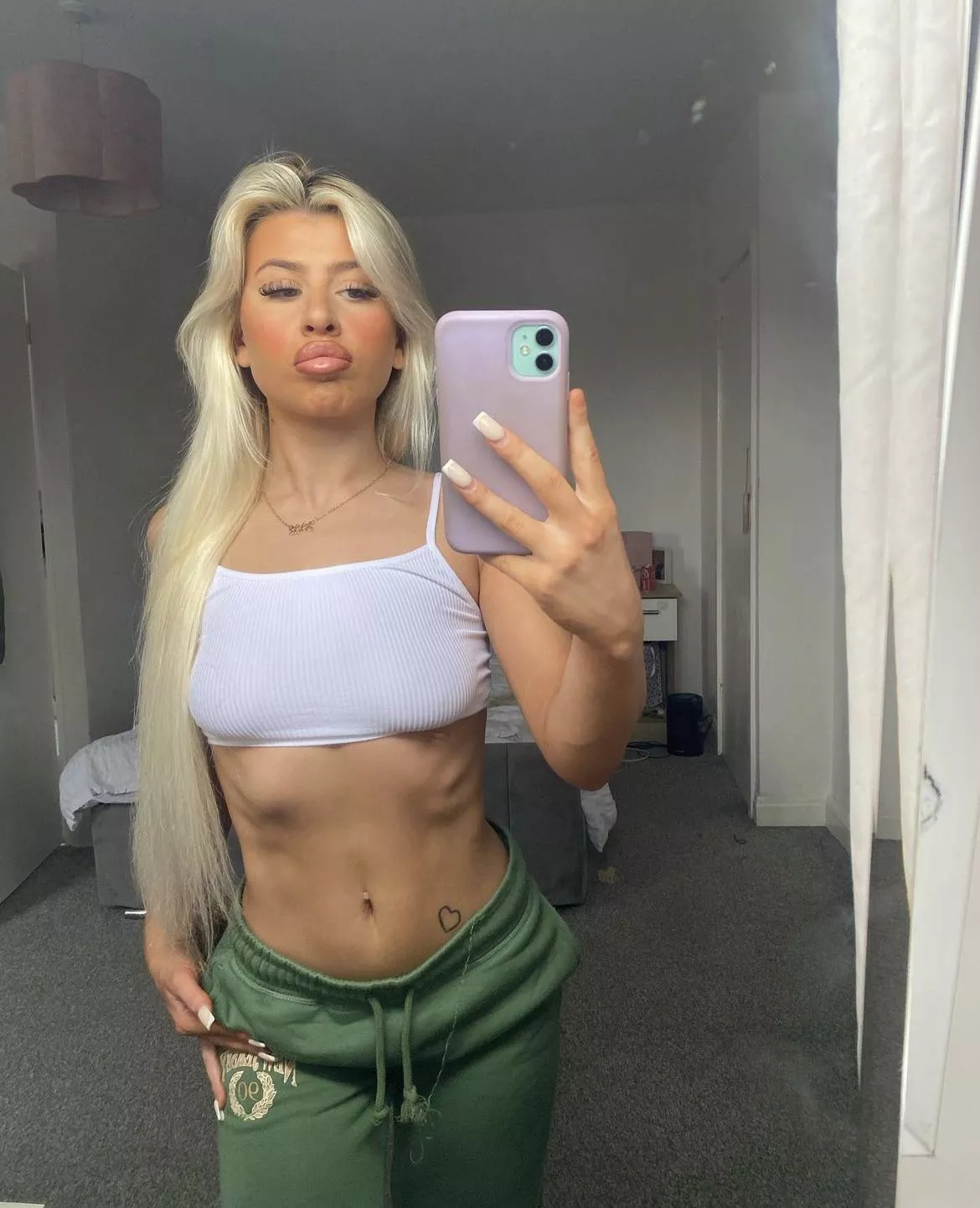 Young milf still likes showing off